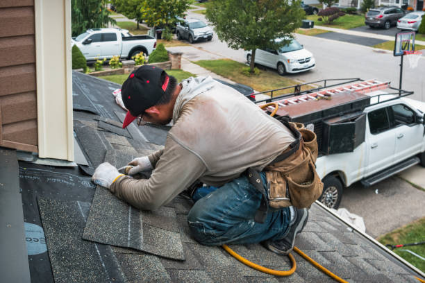Professional Roofing technician working in Webster, IN